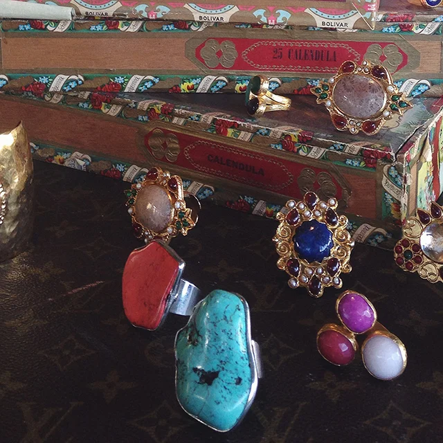 A collection of gold dipped, semi-precious stone rings from Turkey.