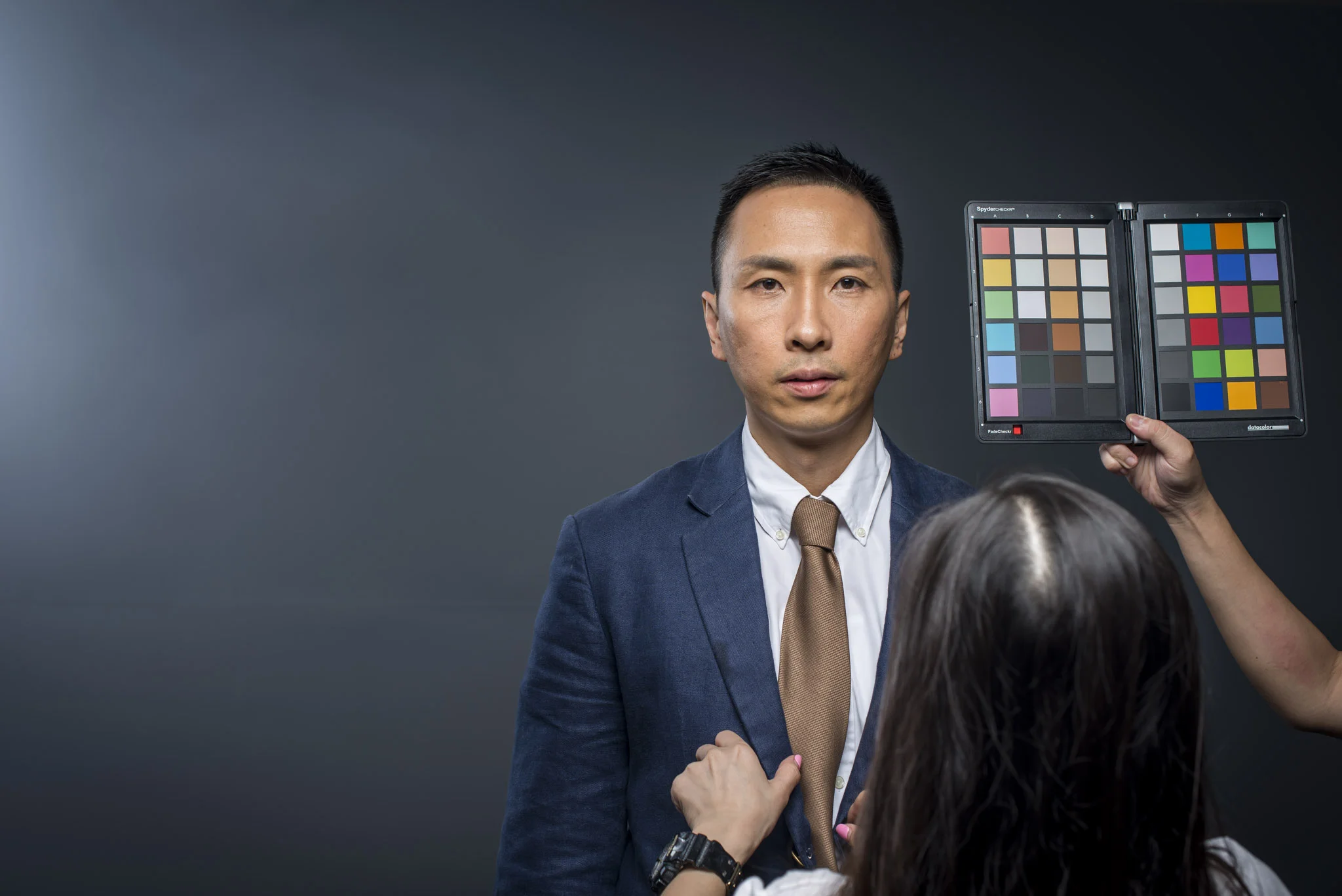 PRECISE CONSISTENCY: Using a colour table to ensure that the background remains a consistent gray in post-processing. Photo by Captured.