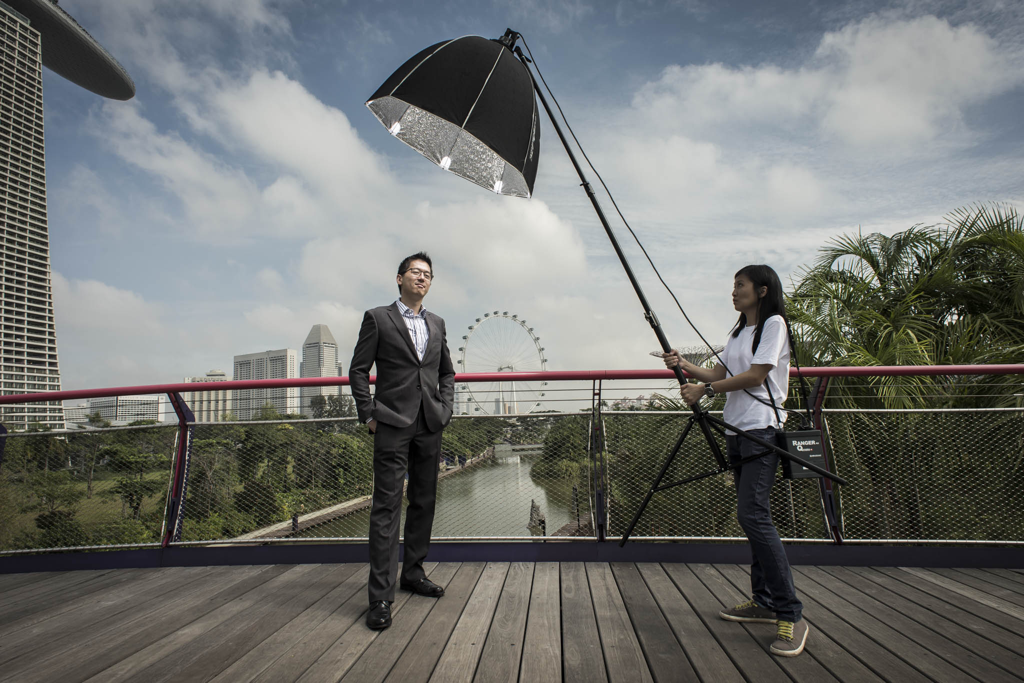 LIGHTS, CAMERA, ACTION: A good photographer makes sure his lighting is perfectly tuned before the client arrives. Photo by Captured.