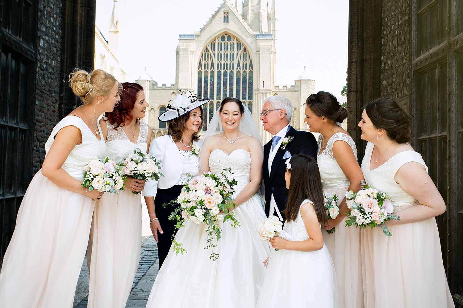 informal-bridal-party-portrait-norwich-cathedral.jpg