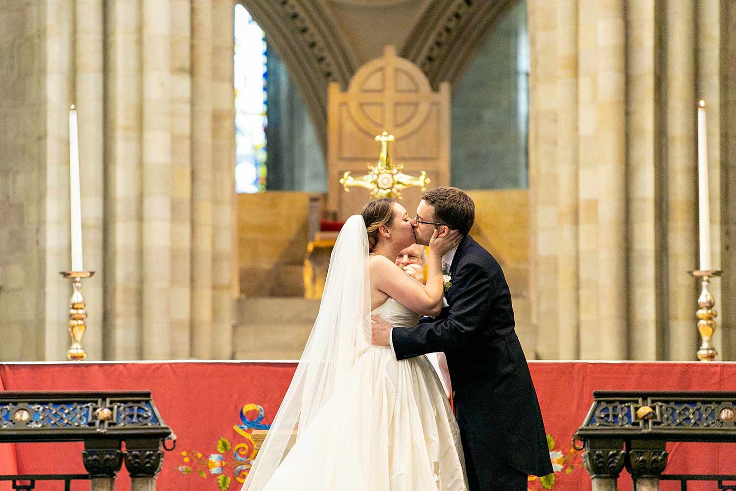 norwich-cathedral-wedding-first-kiss.jpg