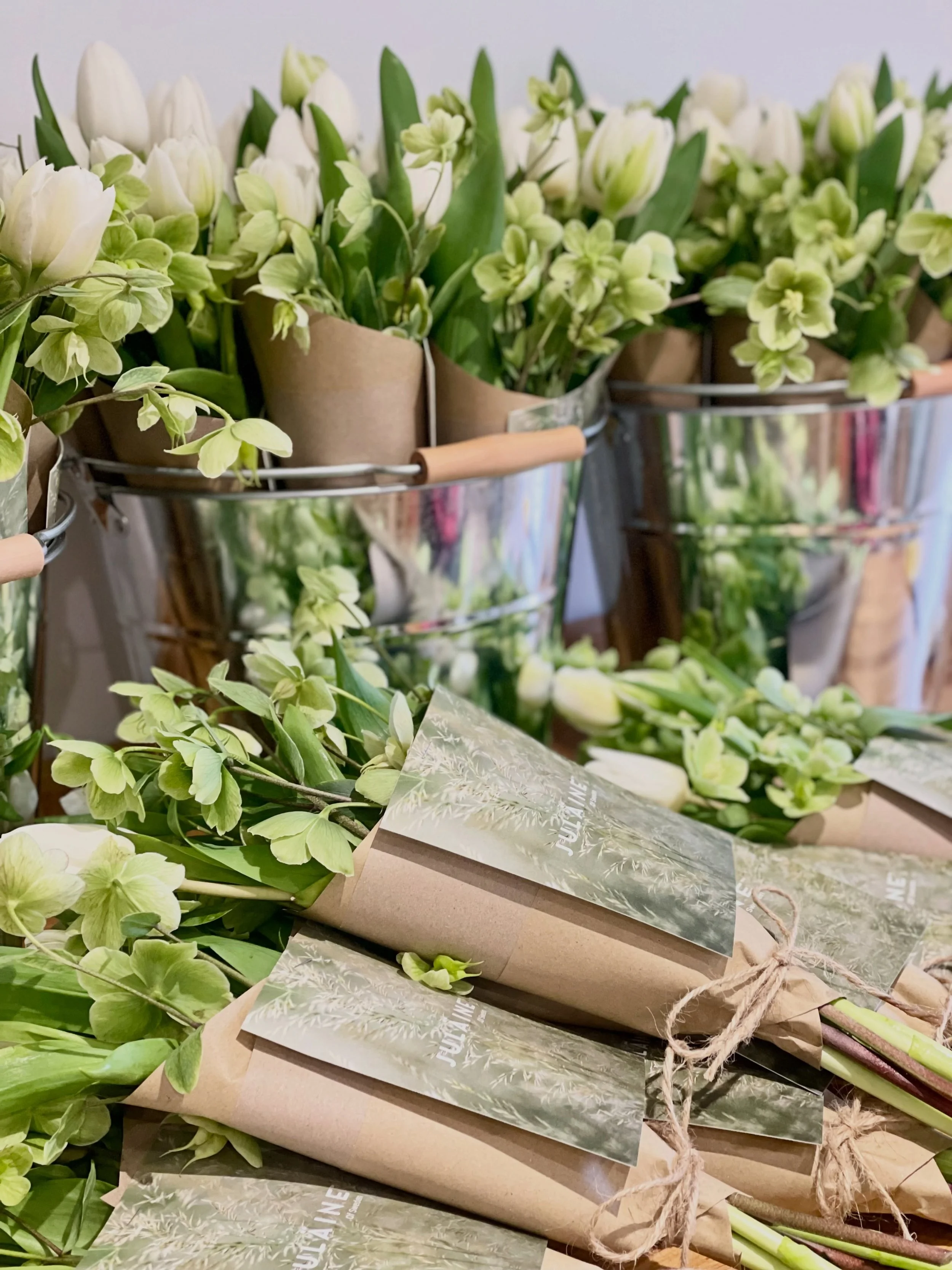 Lots of mini spring bouquets going out the door today! 💐 #springblooms #corporateflowers #bouquets