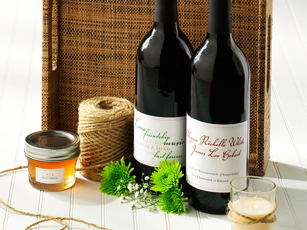 Mossy green, apple red and autumn orange rustic fall invitation design. Label design for wine bottles, red and white that where included in the welcome baskets to guests. Labels for homemade apple jelly given as favors at the wedding.