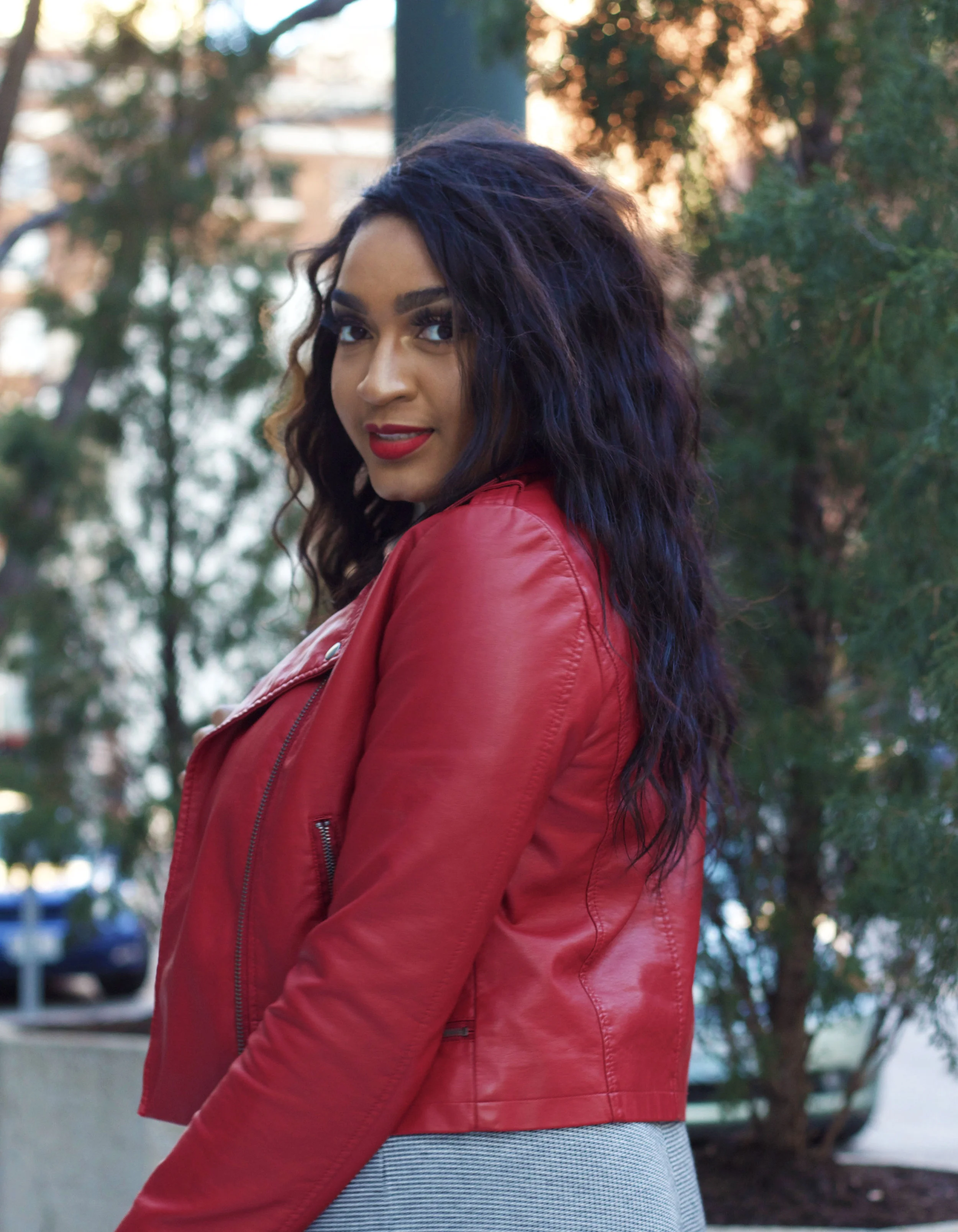 Jasmine Diane in red moto jacket from Forever21 in downtown kansas city.jpg