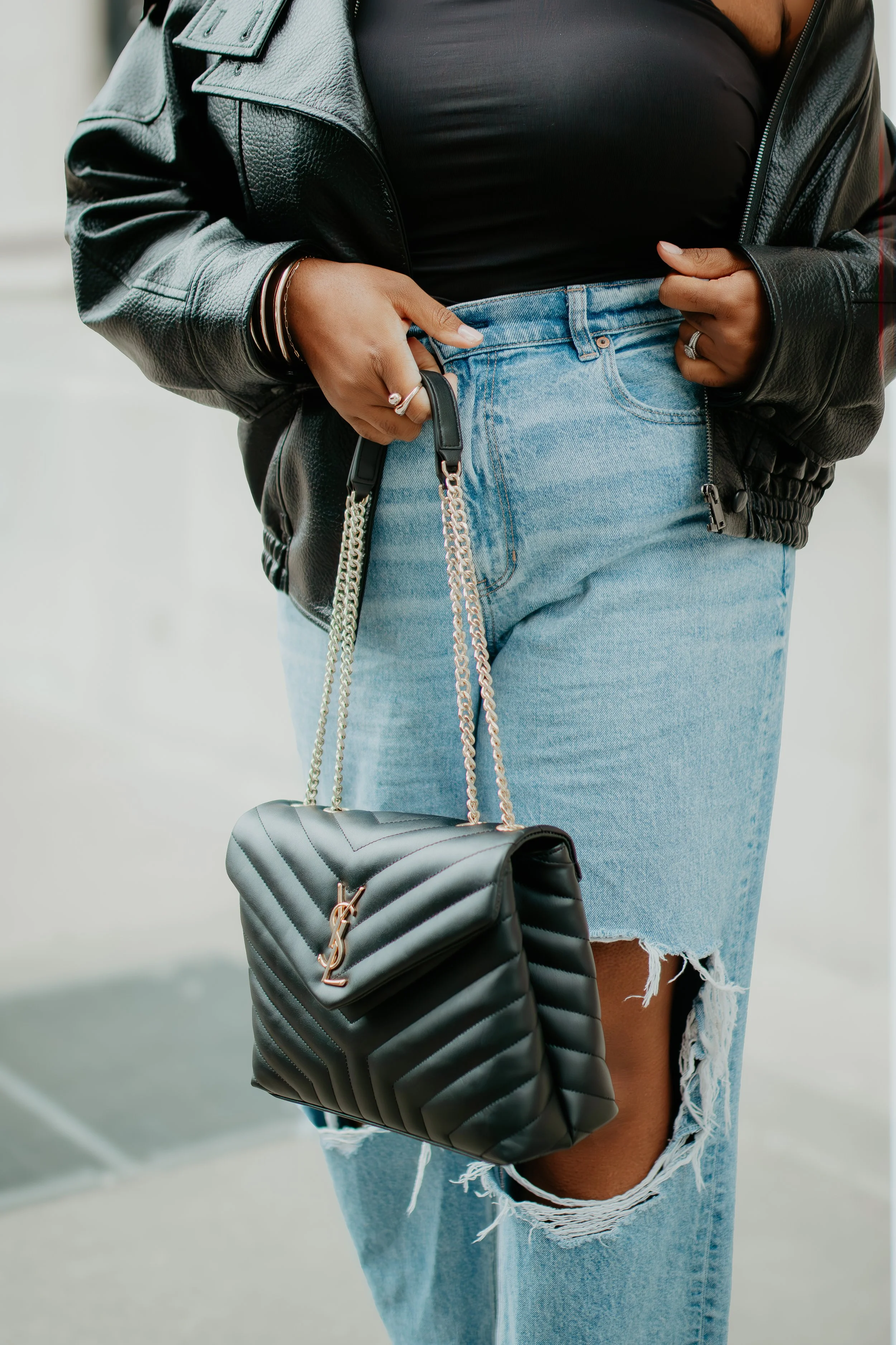 black ysl handbag street style