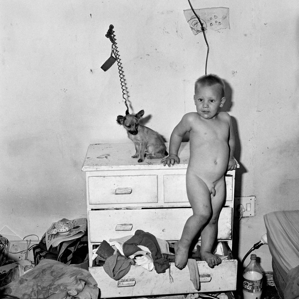 Roger Ballen - Baby on Chest of Drawers, 2000