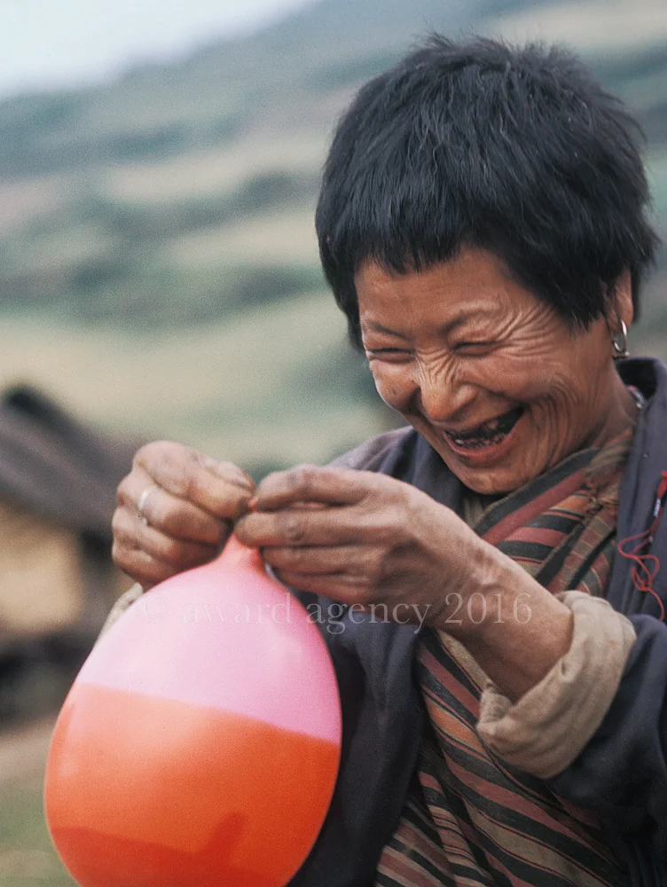 bhutan-woman-with-balloon.jpg