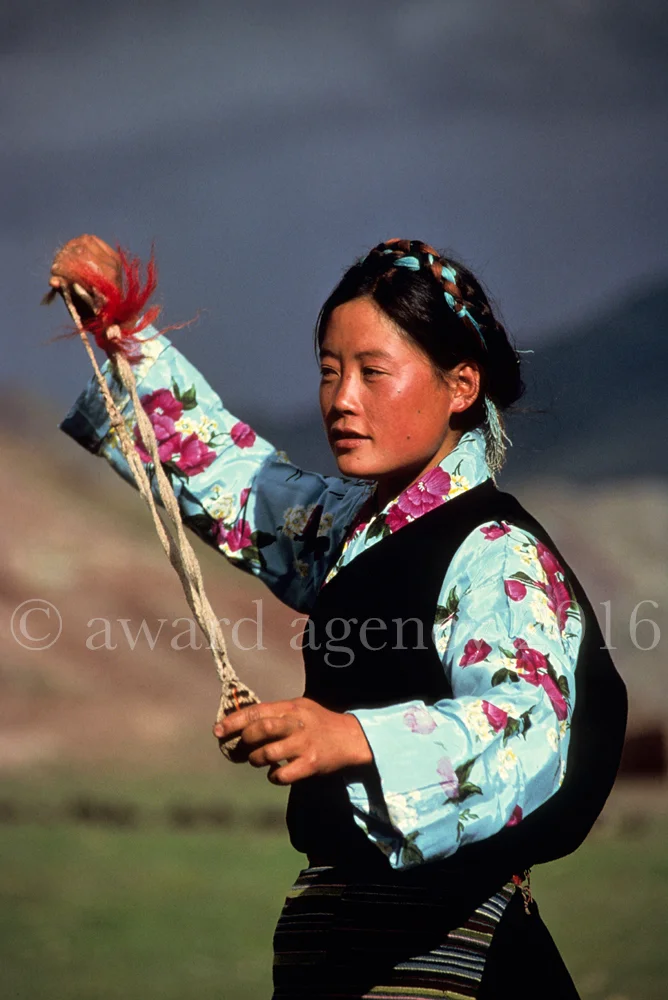 tibetan-slingshot-woman-edit2-corbis-16x24.jpg