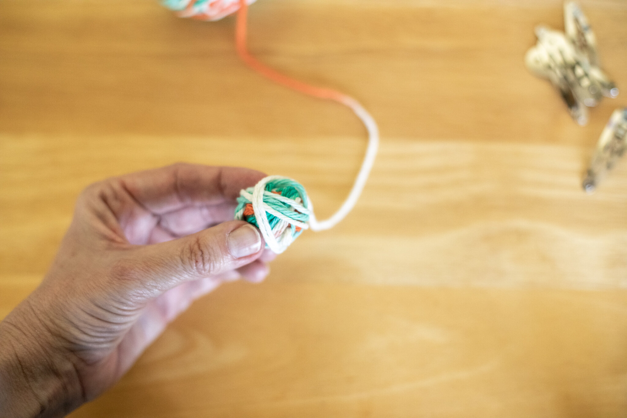  Turn your ball every one in awhile to change the direction of the yarn being added to the ball. 