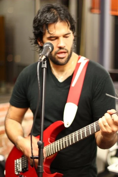 Mauro playing guitar