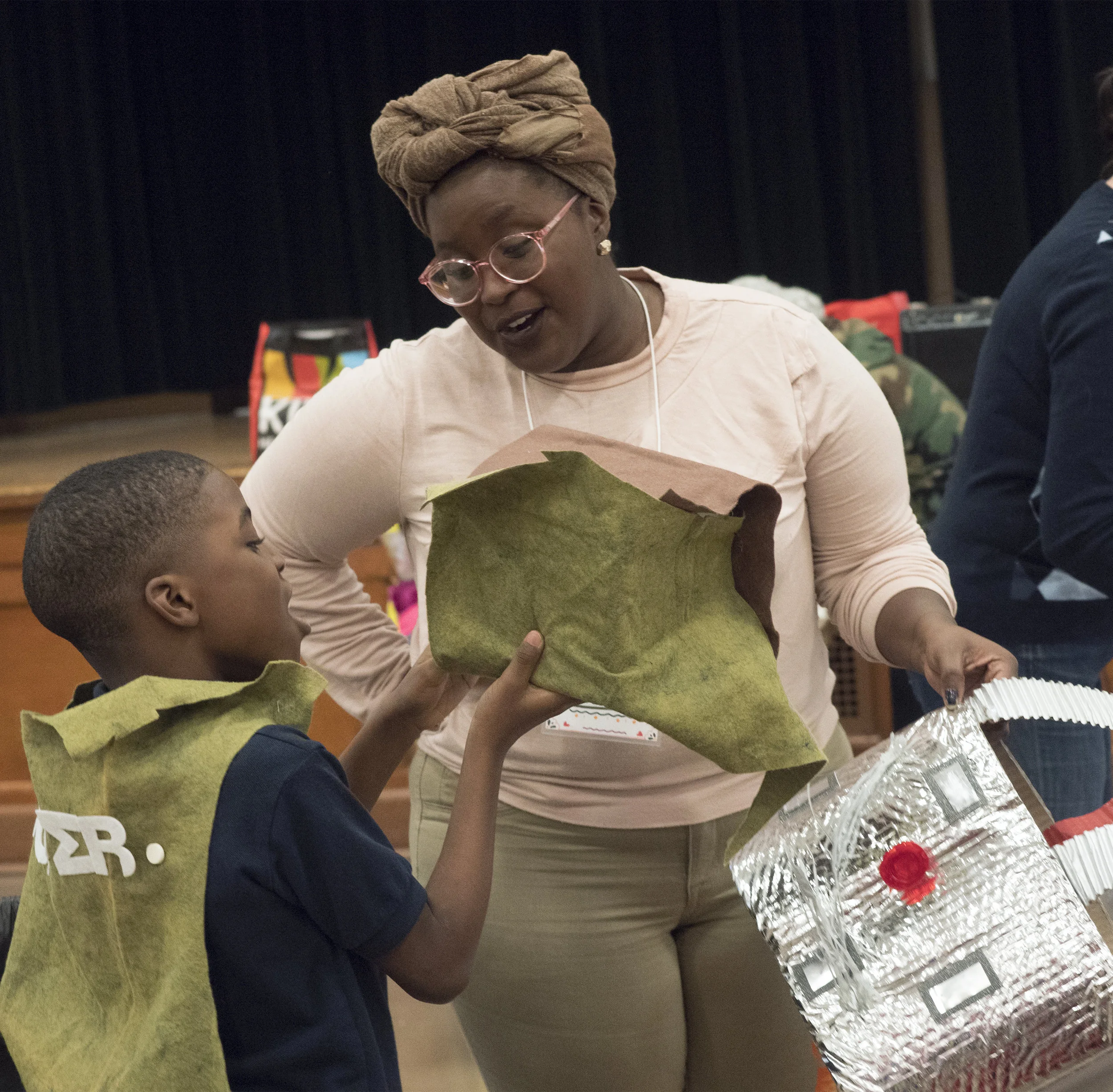  12/2107-Minneapolis, St. Paul, MN - Art Buddies. Kids make costumes with materials from bins of crafts.  