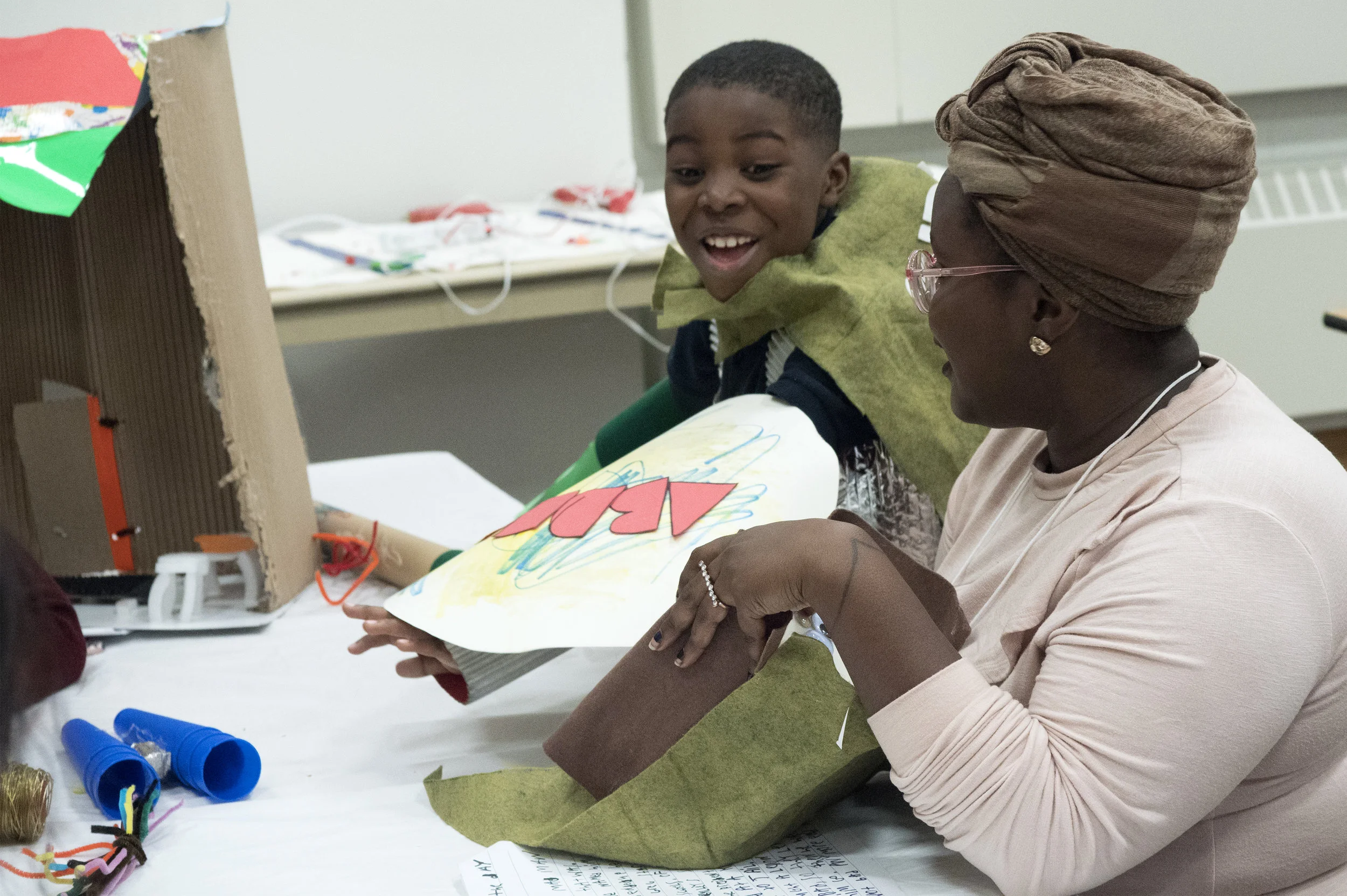  12/2107-Minneapolis, St. Paul, MN - Art Buddies. Kids make costumes with materials from bins of crafts.  