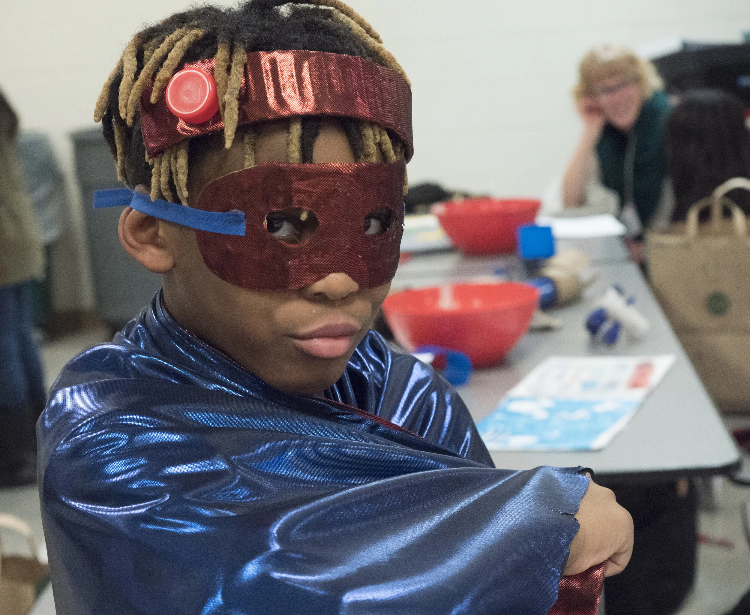  12/2107-Minneapolis, St. Paul, MN - Art Buddies. Kids make costumes with materials from bins of crafts.  