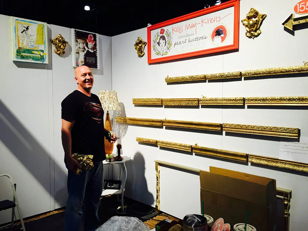 Setting up our corner booth #1559