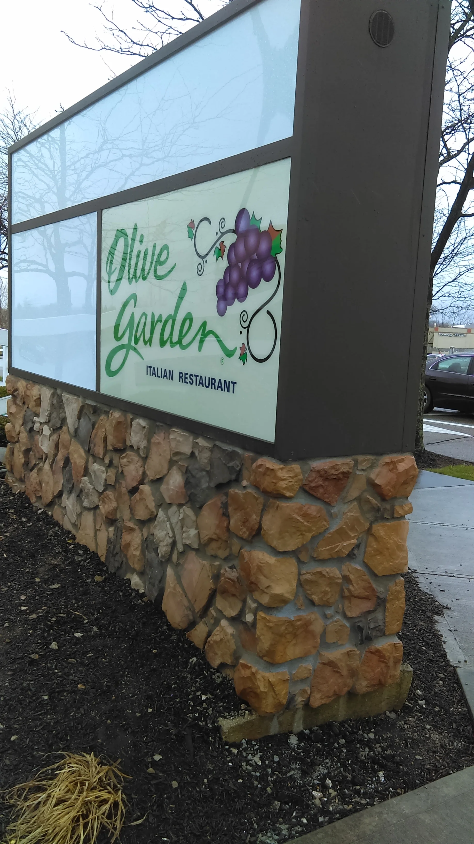 Remodeled the sign and stone pedestal for this Olive Garden after a car accident.