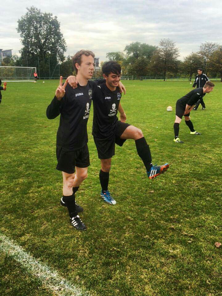 United's goalscorers, Evan and Donald, share a joke in the warm up.