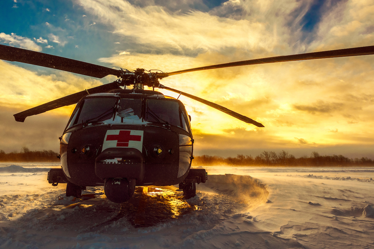 Icy Dawn HH-60 MEDEVAC Blackhawk with C 3-10 GSAB sits ready to respond as the sun rises and during a Lake Effect Storm Warning