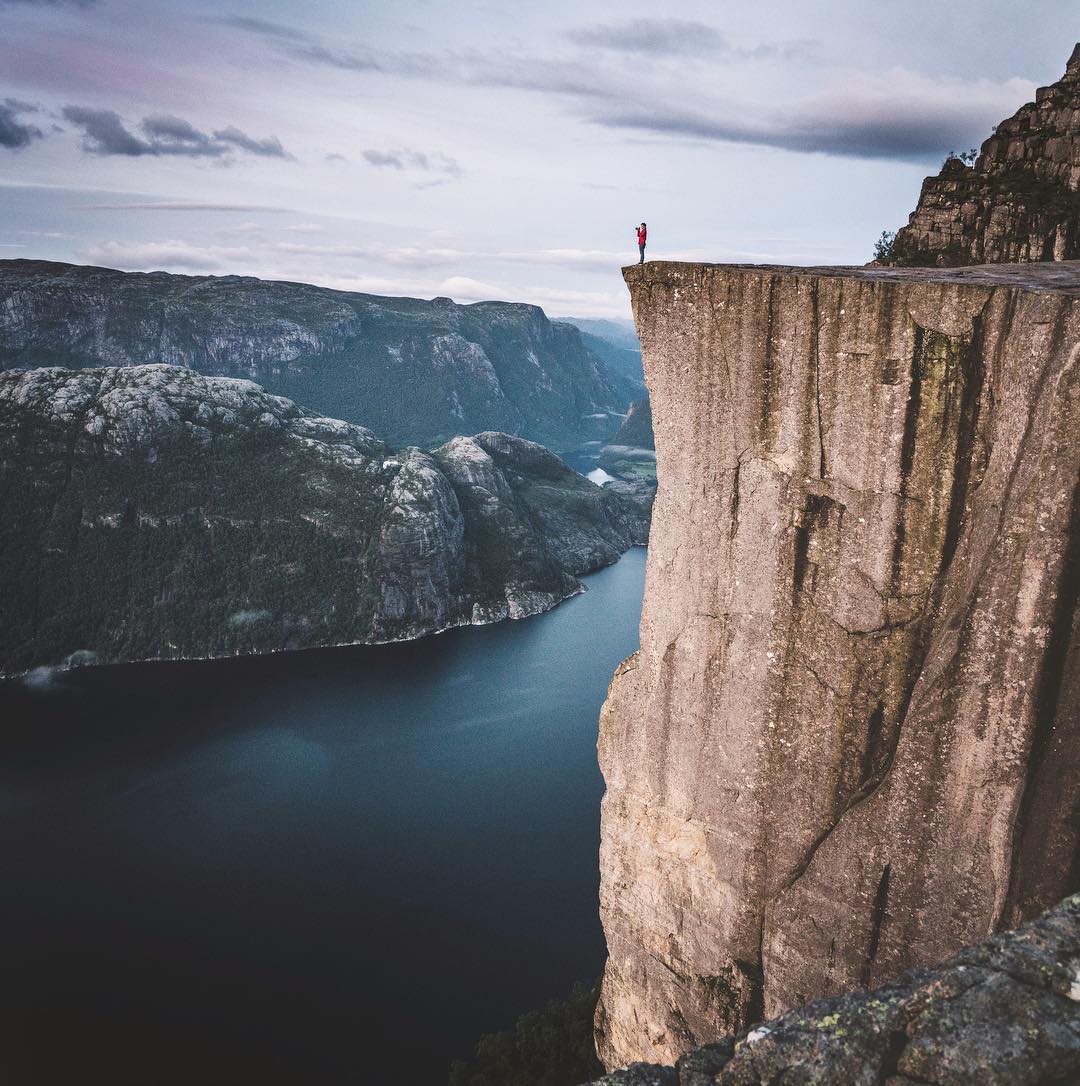 This photo, taken by Zingg of a traveling companion in Norway, is reminiscent of the Glacier Point photographs taken in Yosemite in the late 1800s, such as the one by George Fiske seen below.