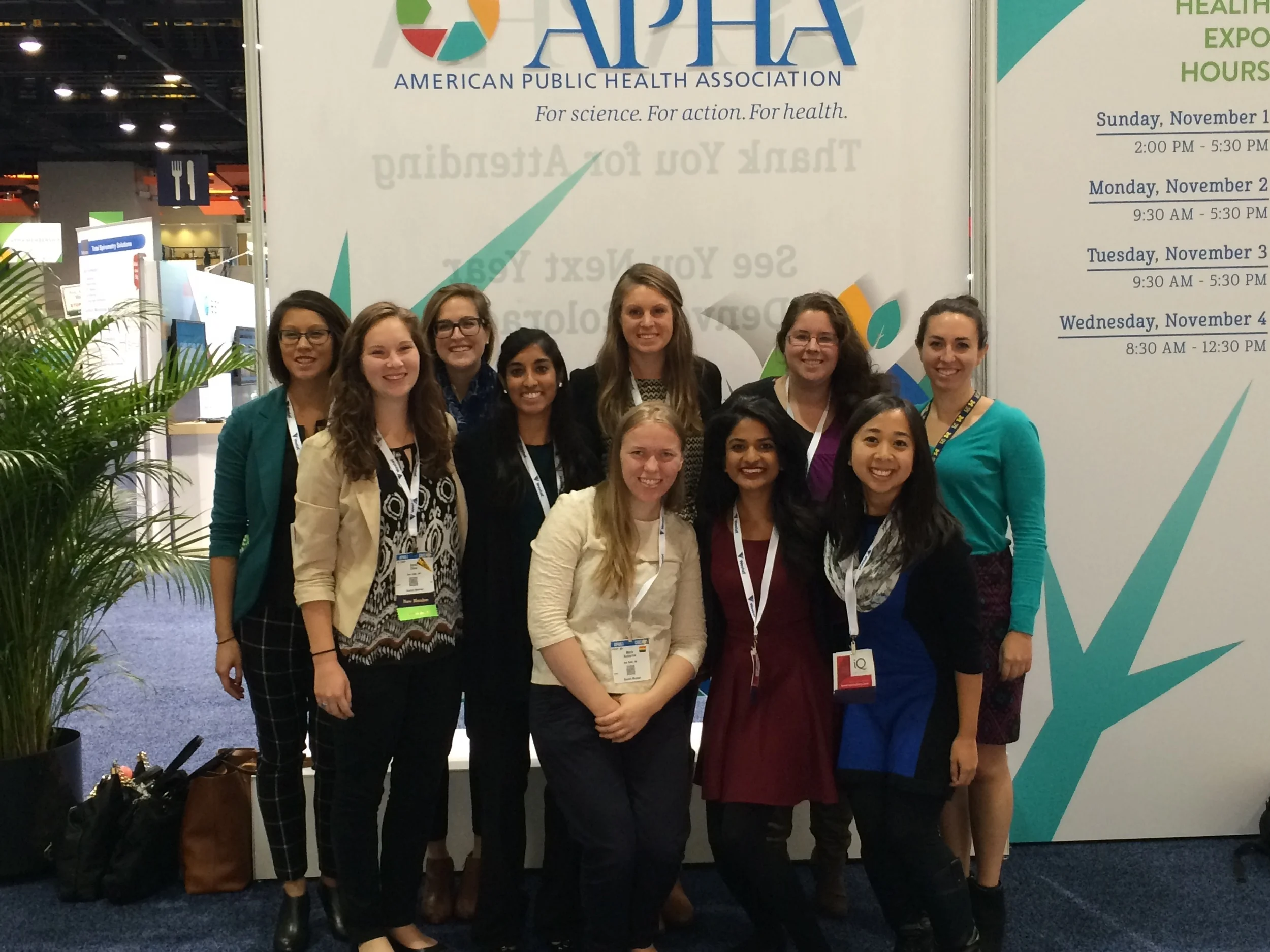 The author (back row, far right, in teal) with other students from the University of Michigan School of Public Health at the conference.
