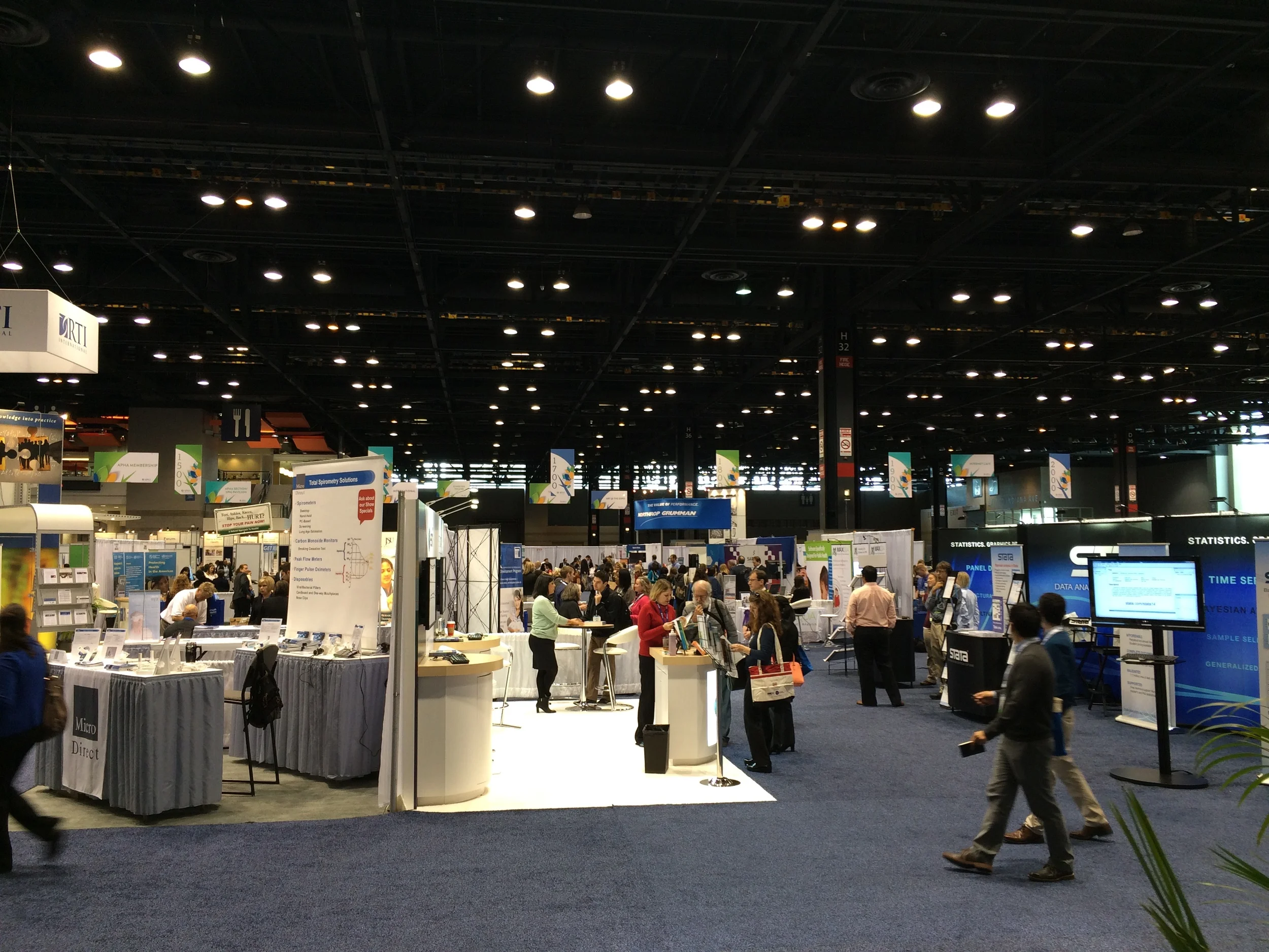 The view from the conference's main hall with busy exhibits at APHA 2015.