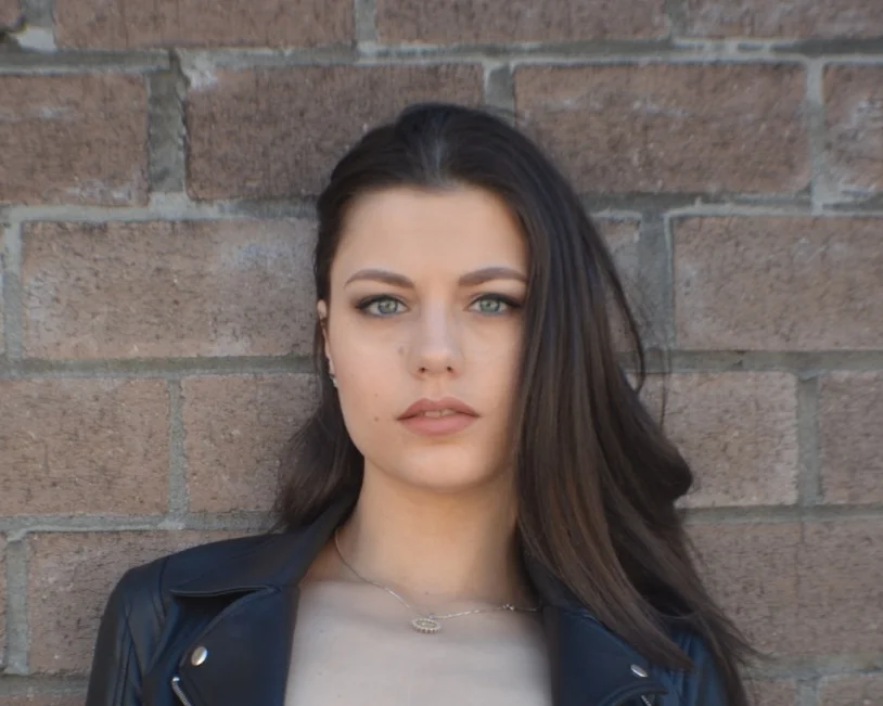 Deep Blue Eyes on Brick headshot