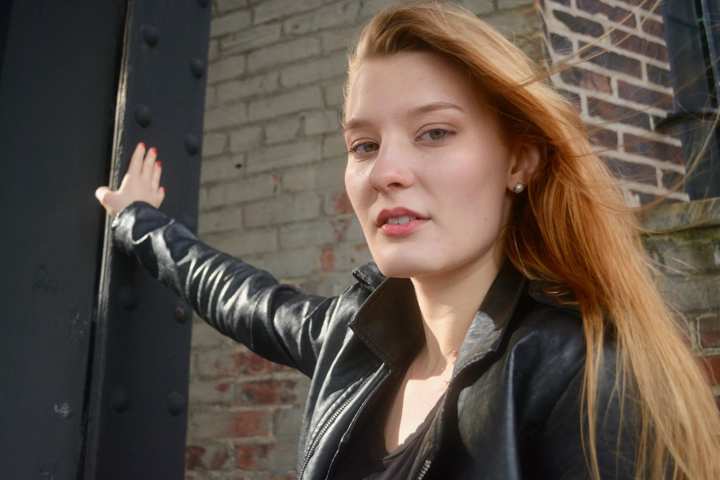 Focus Frame Headshot Brick BGND.jpeg