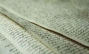 old handwritten papers.jpg