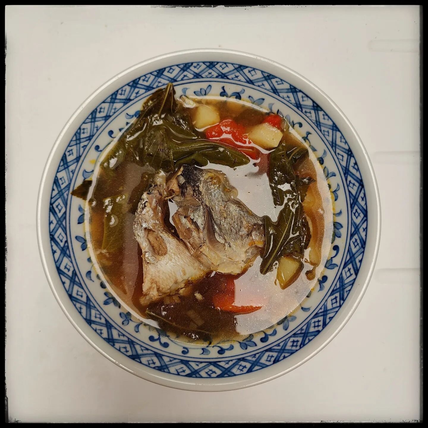 Just some sea bream head sinigang for lunch today. A stew soured with tamarind paste, flavoured with patis (fish sauce), salt and black pepper, bulked up with tomatoes, carrots, sayote (chow chow) and alugbati (Malabar spinach), and of course complet