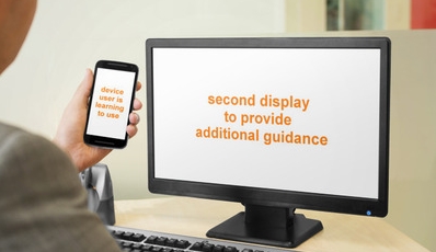  We explored the concept of using a second display to help a user learn to use a mobile device. 