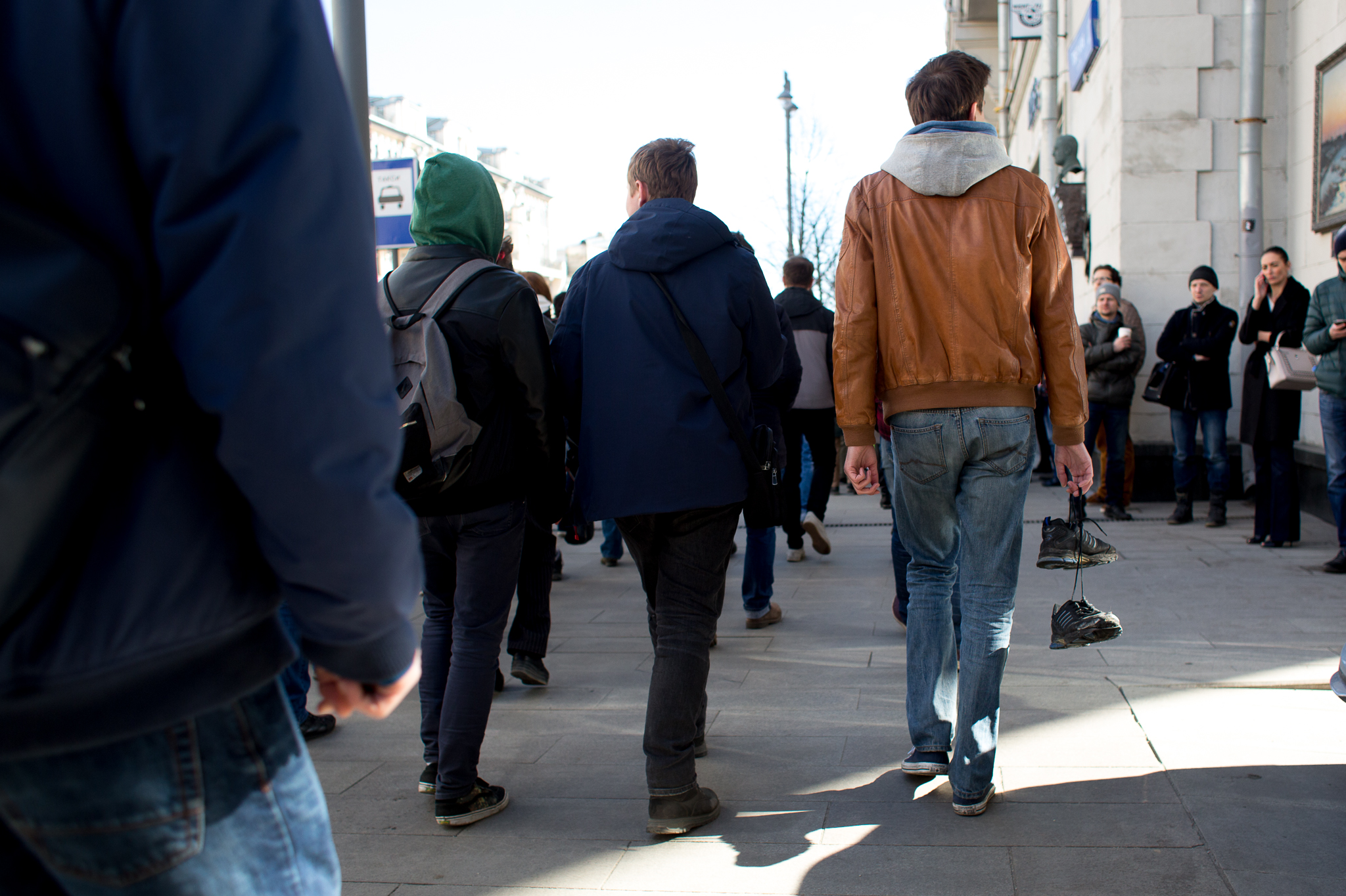 Many protesters carried sneakers as a silent form of protest, referring to a recent scandal around Prime Minister Dmitri Medvedev. 