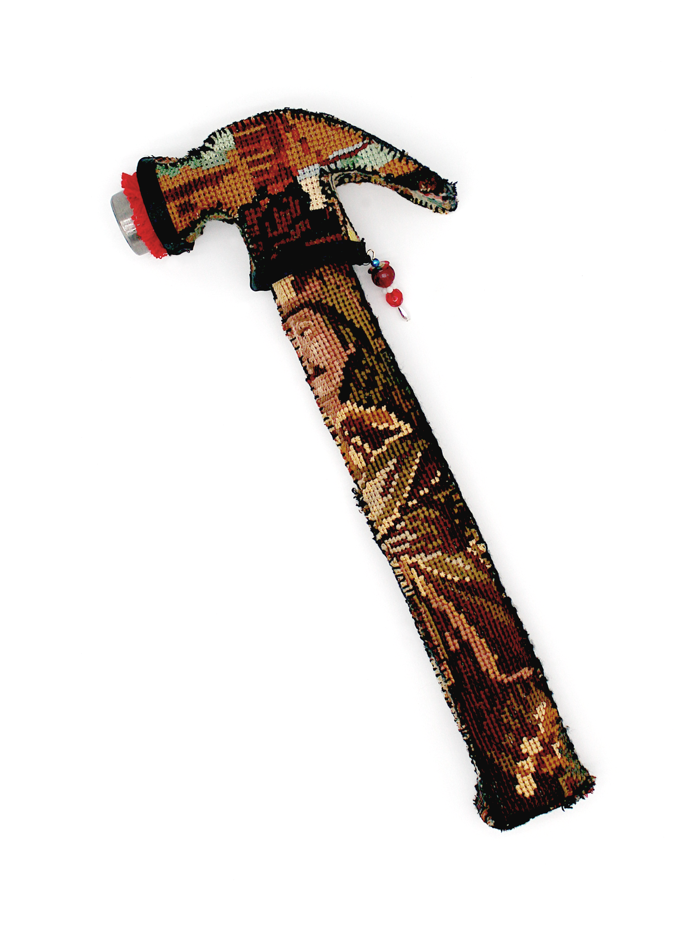 A hammer covered in a red and browns cross-stitch of a 17th century gentleman.
