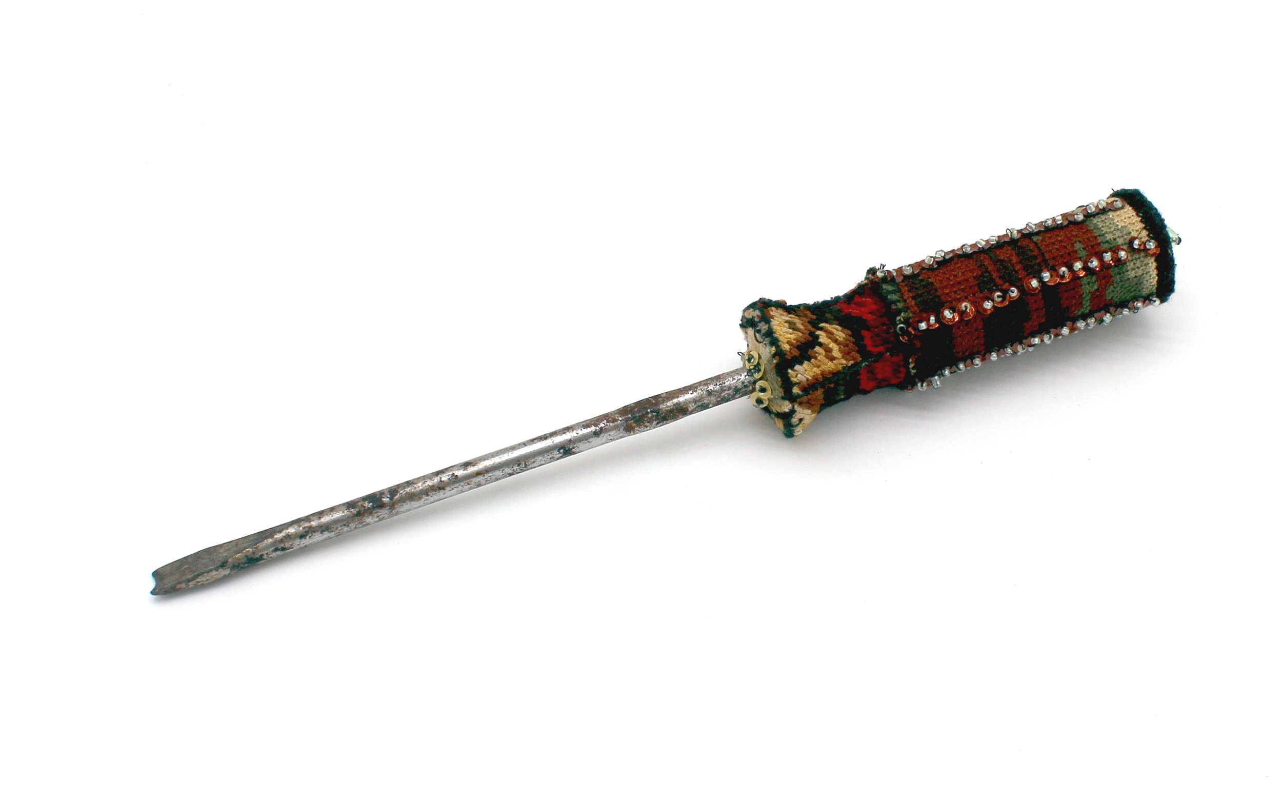 A flathead screwdriver with a fabric-covered handle embellished with small beads,