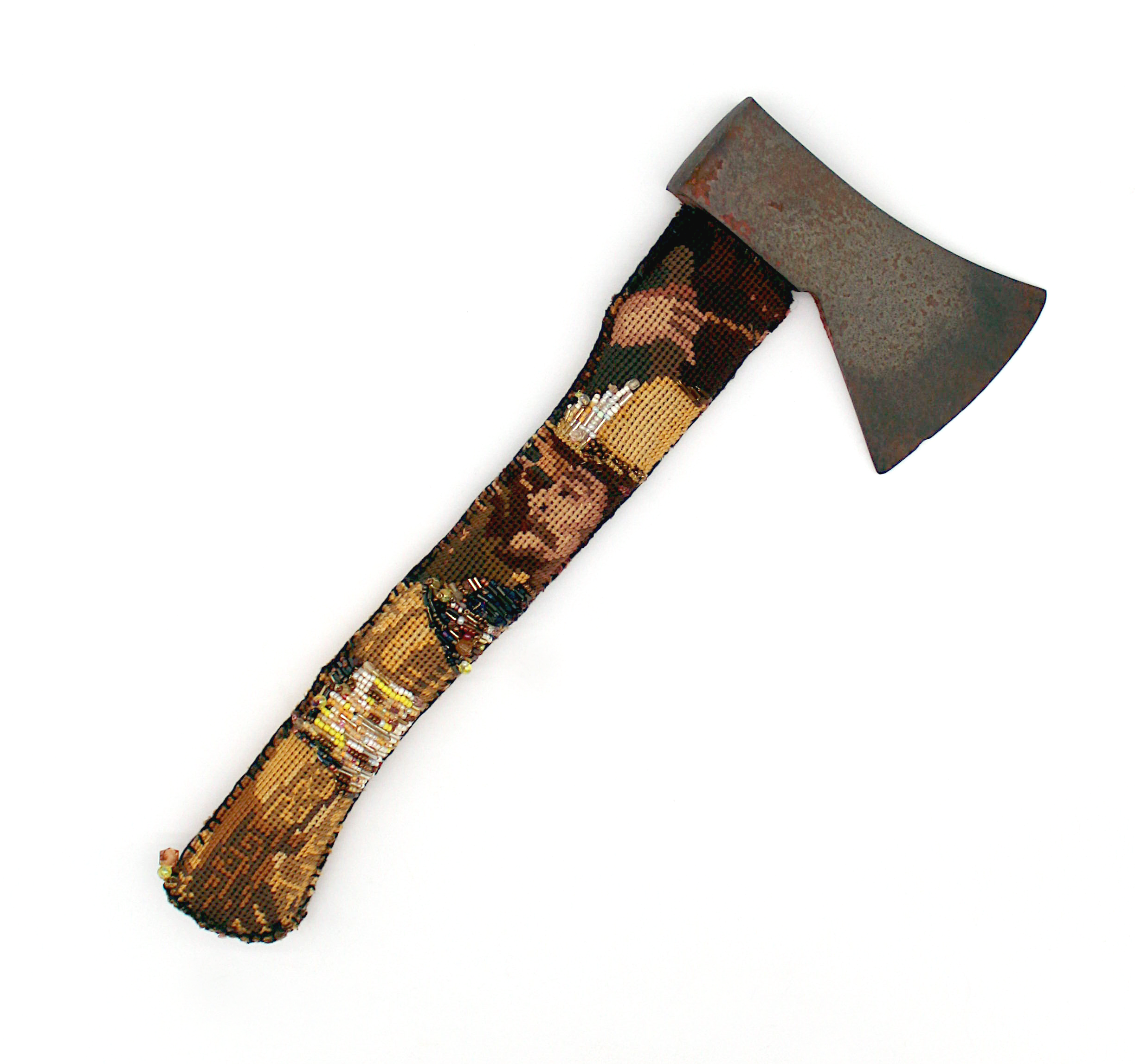 A small hatchet with the handle covered in a cross-stitch of a 17th century gentleman that has been accented with bead embroidery work.