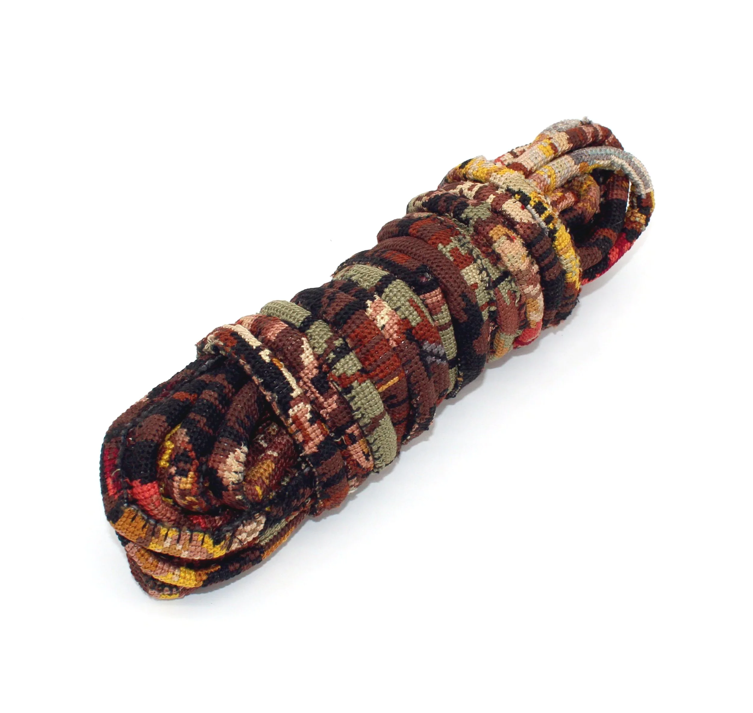 A coil of rope made from strips of cross-stitch of the Rembrandt painting The Night Watch.