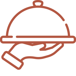 Hand holding a tray with a covered cloche