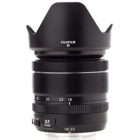 Fujifilm XF 18-55.. F2.8-4 LM OIS - Awesome mid range zoom that equates to a 27.4-83.8mm zoom range on a full frame. Small, light decent focusing but the kicker is, it has image stabilization which is a much have for any video or low light work. 