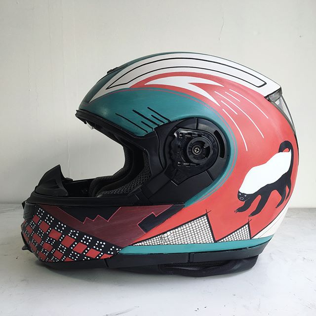 Customized this helmet with layered geometrics and a #honeybadger on each side. Good surface area to work with! We'll paint your #motorcycle helmet if you send it to us.