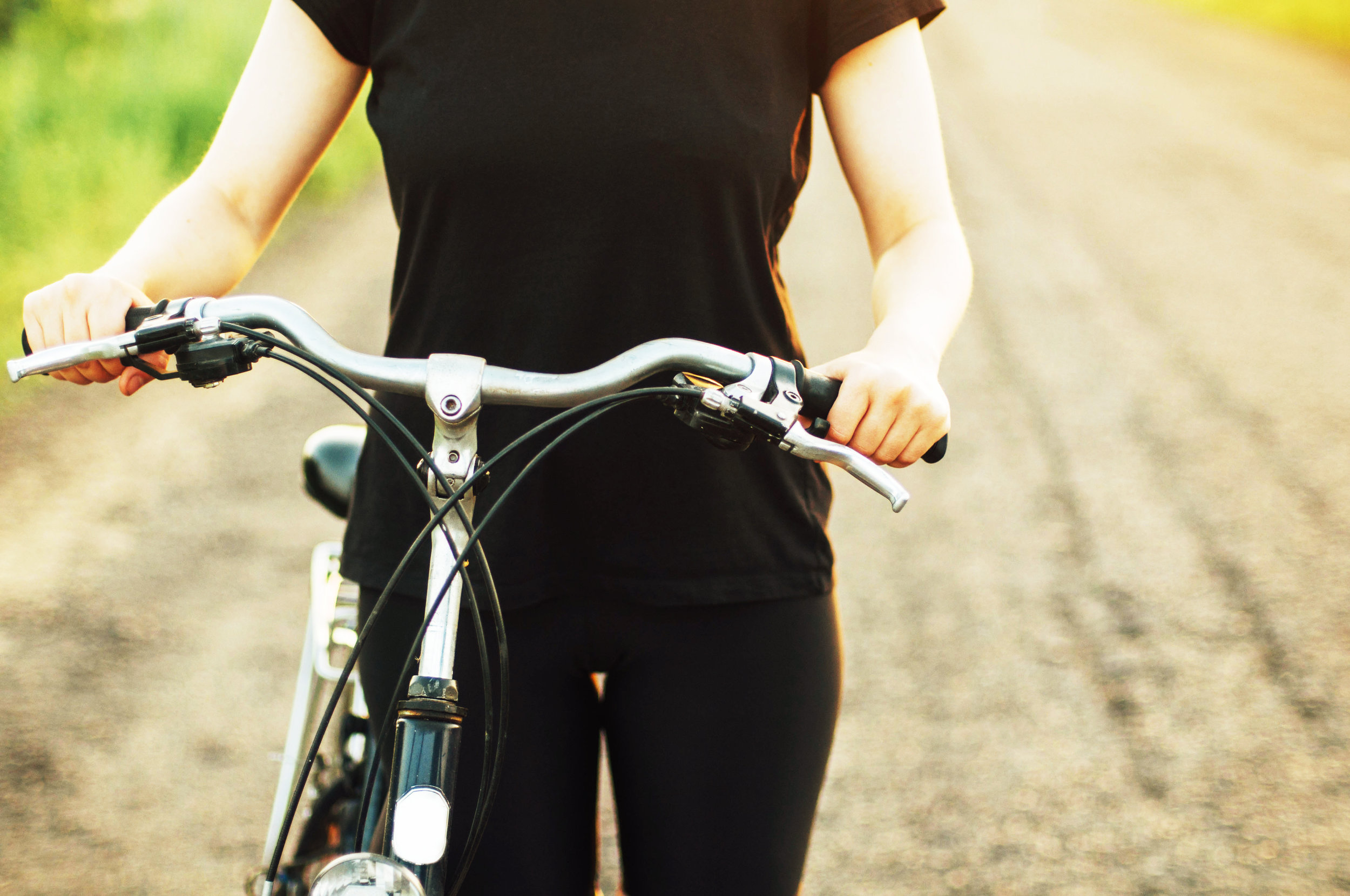 bigstock-Detail-Of-A-Bicycle-Woman-Rid-137602982.jpg