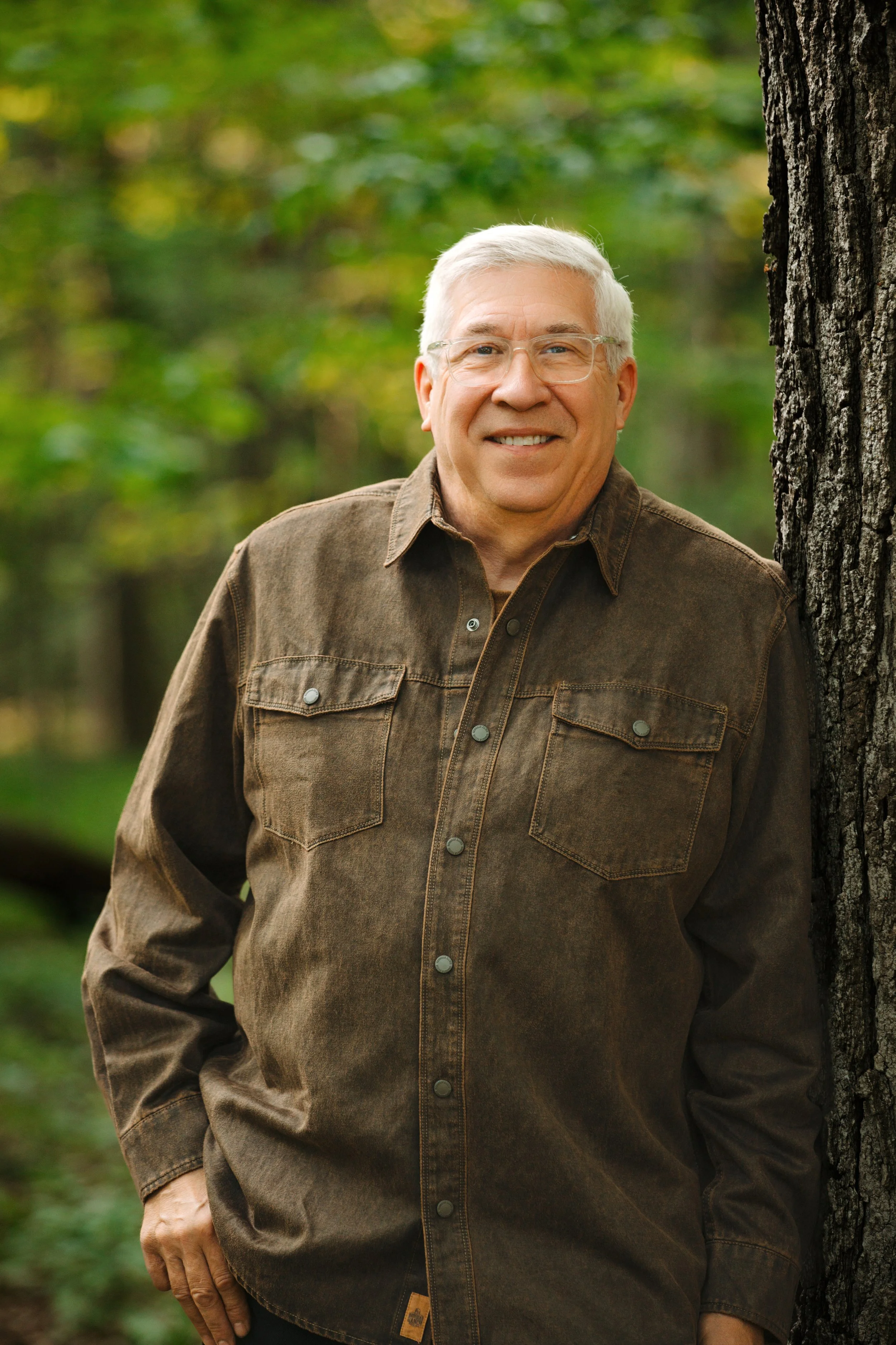 Stan Book Headshot by tree.jpg
