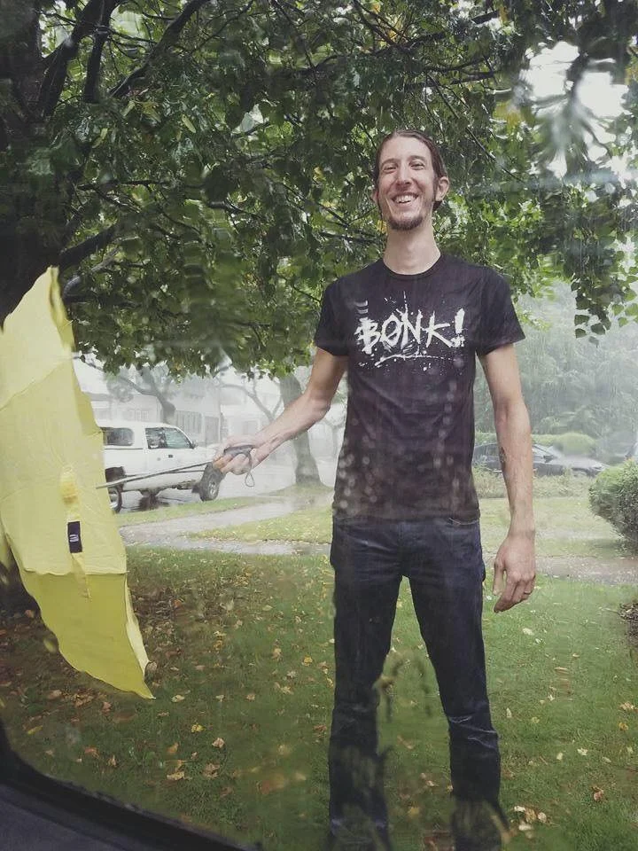Nick in rain laughing.jpg