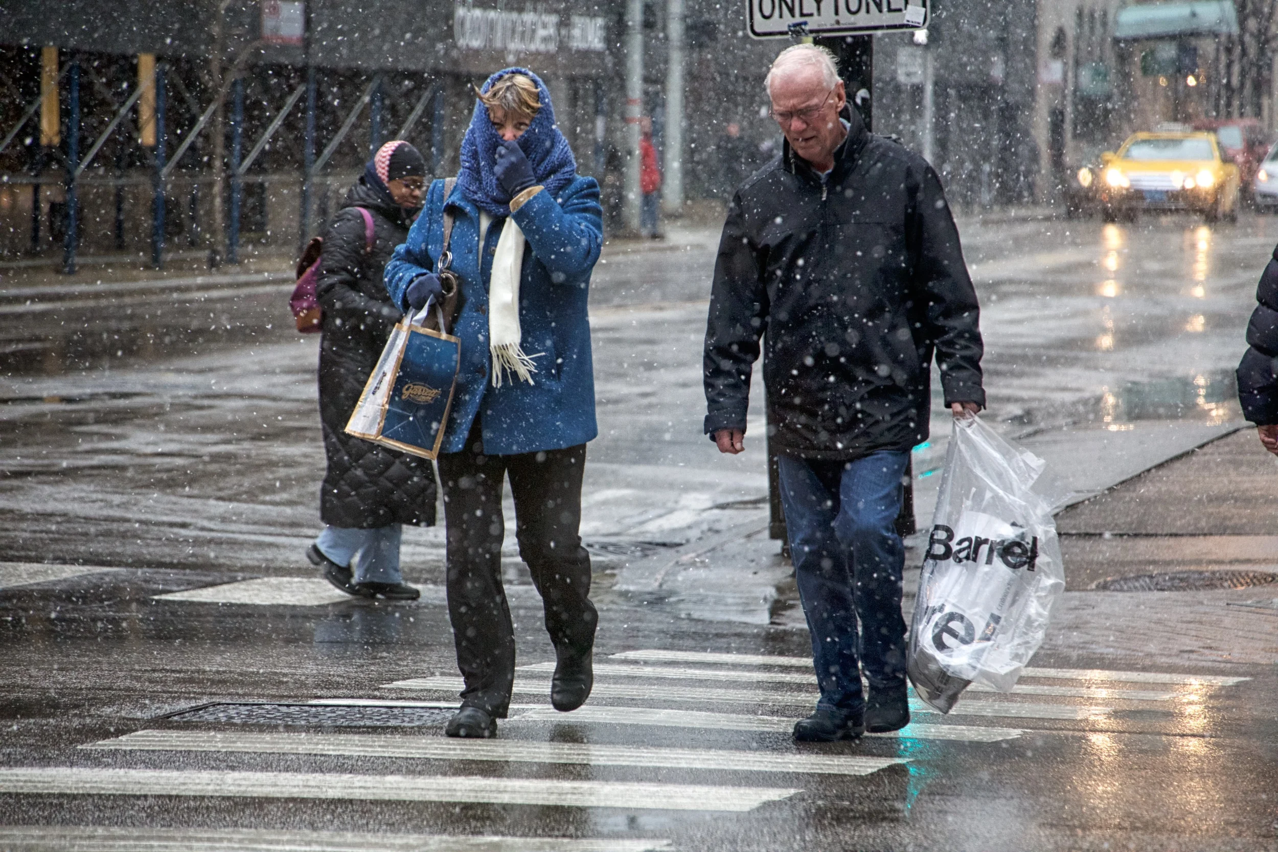 Crossing the street before the signal changes.