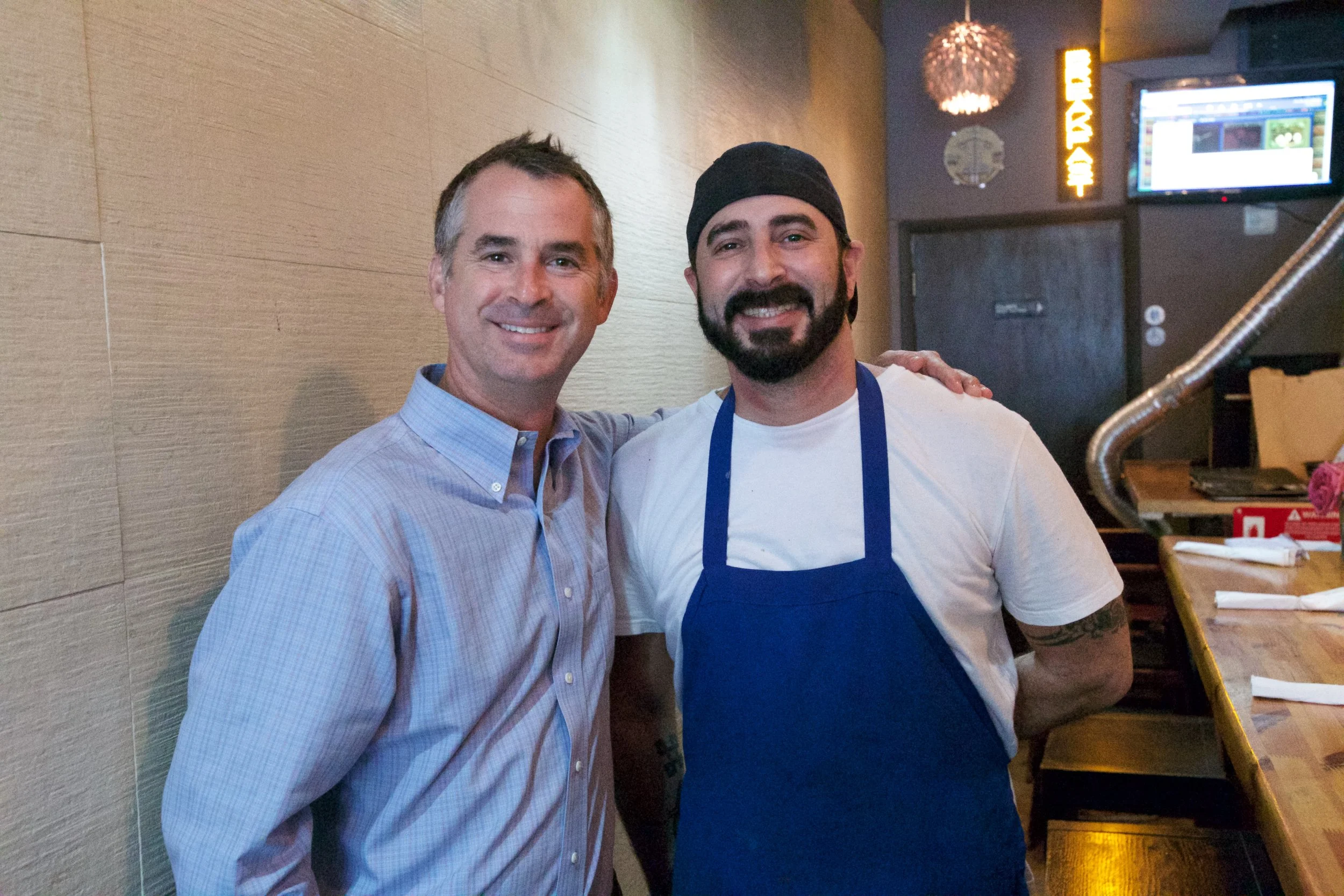 SURFSIDE MAYOR, DANIEL DIETCH, AND DELI OWNER/CHEF, JOSH MARCUS.