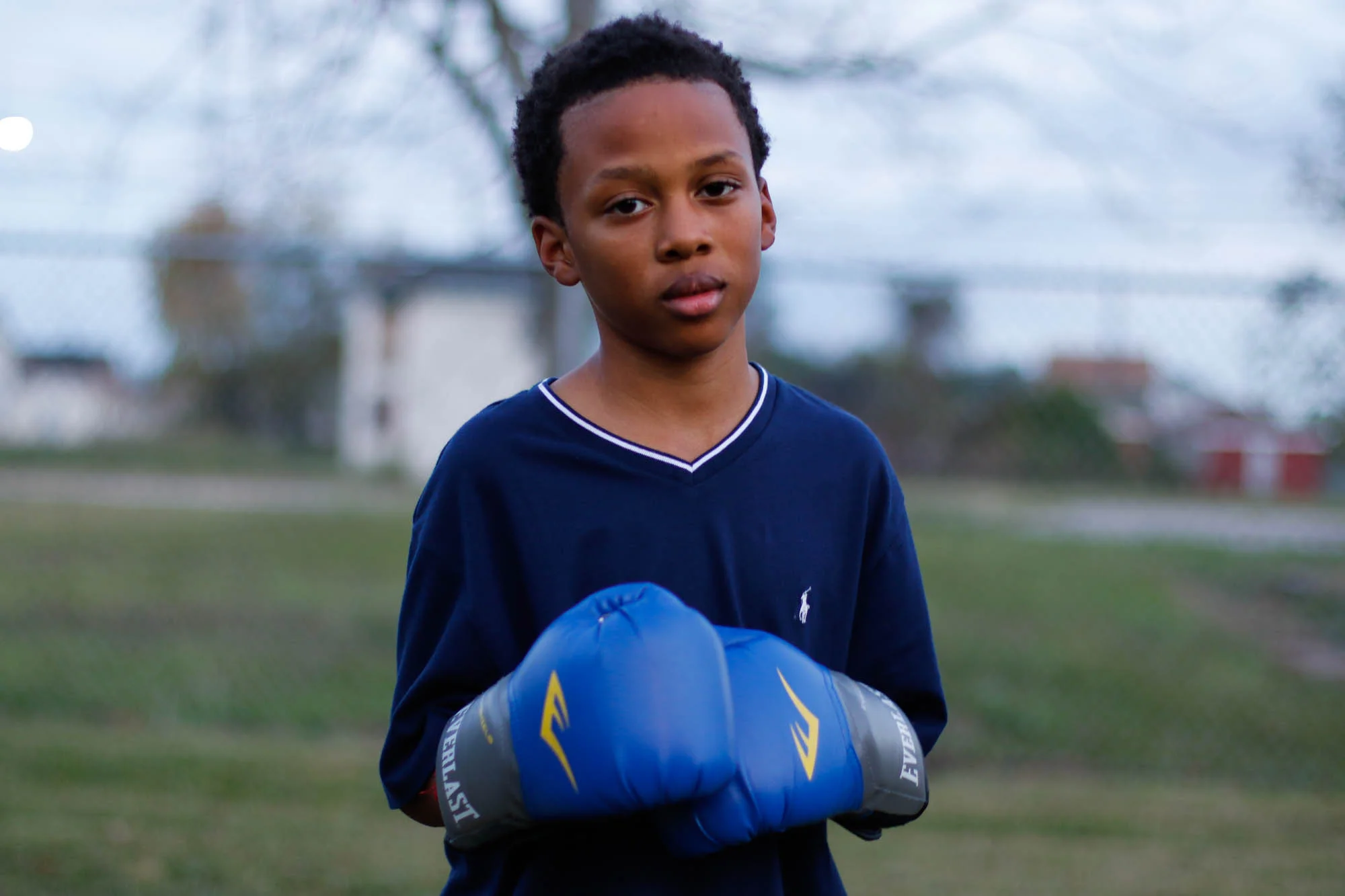 Amarion Ozan, 12, joined the other boys that day after taking a long break from boxing. The next day, Saturday, he will be picked up by Coach Ford to run around the track at the community center. Coach Ford wants him to continue training to compete in a tournament in 2016.
