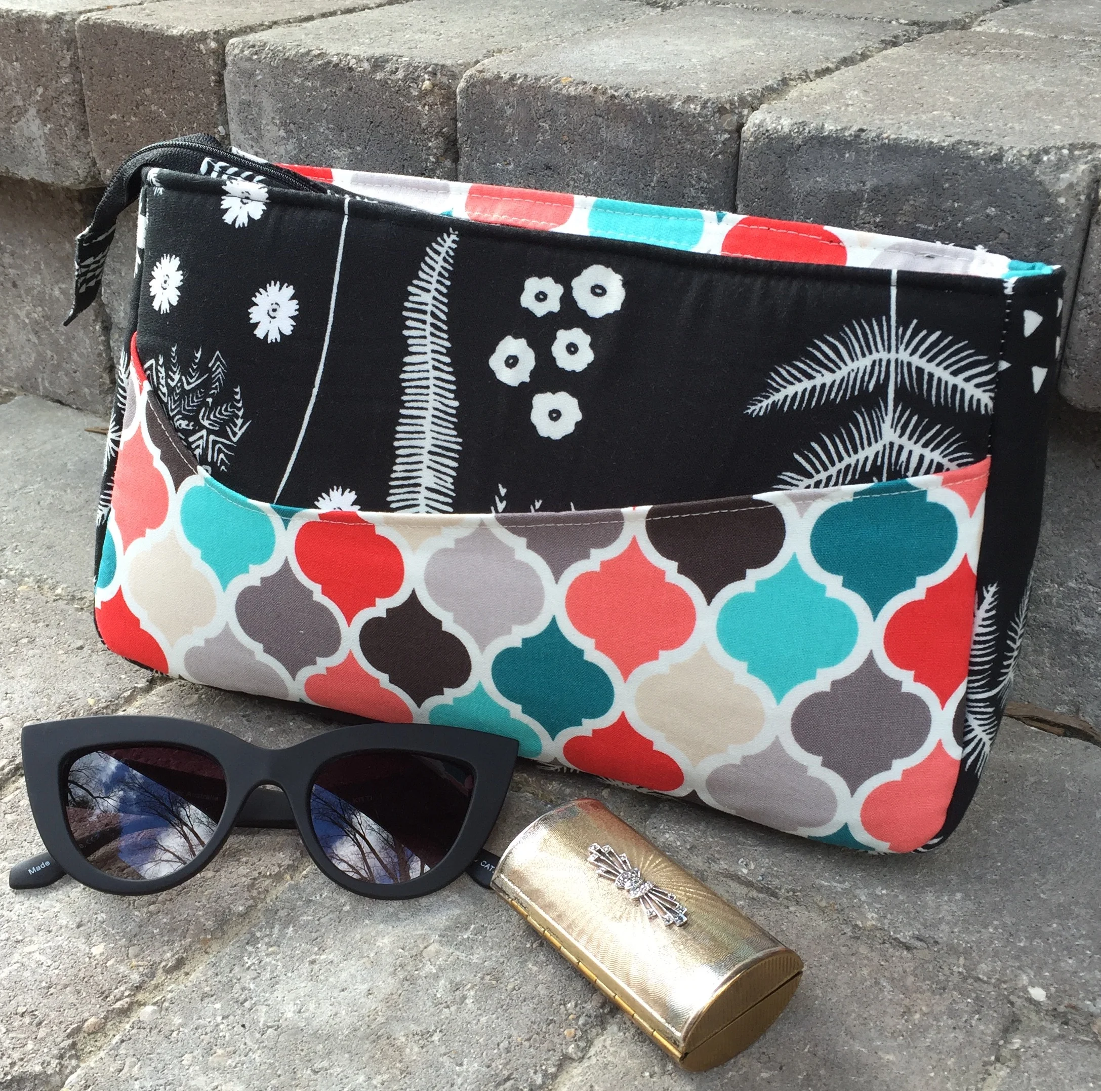 Carry All Flexi Clutch pattern by Two Pretty Poppets. Fabric by Cotton and Steel and Joann Fabrics.