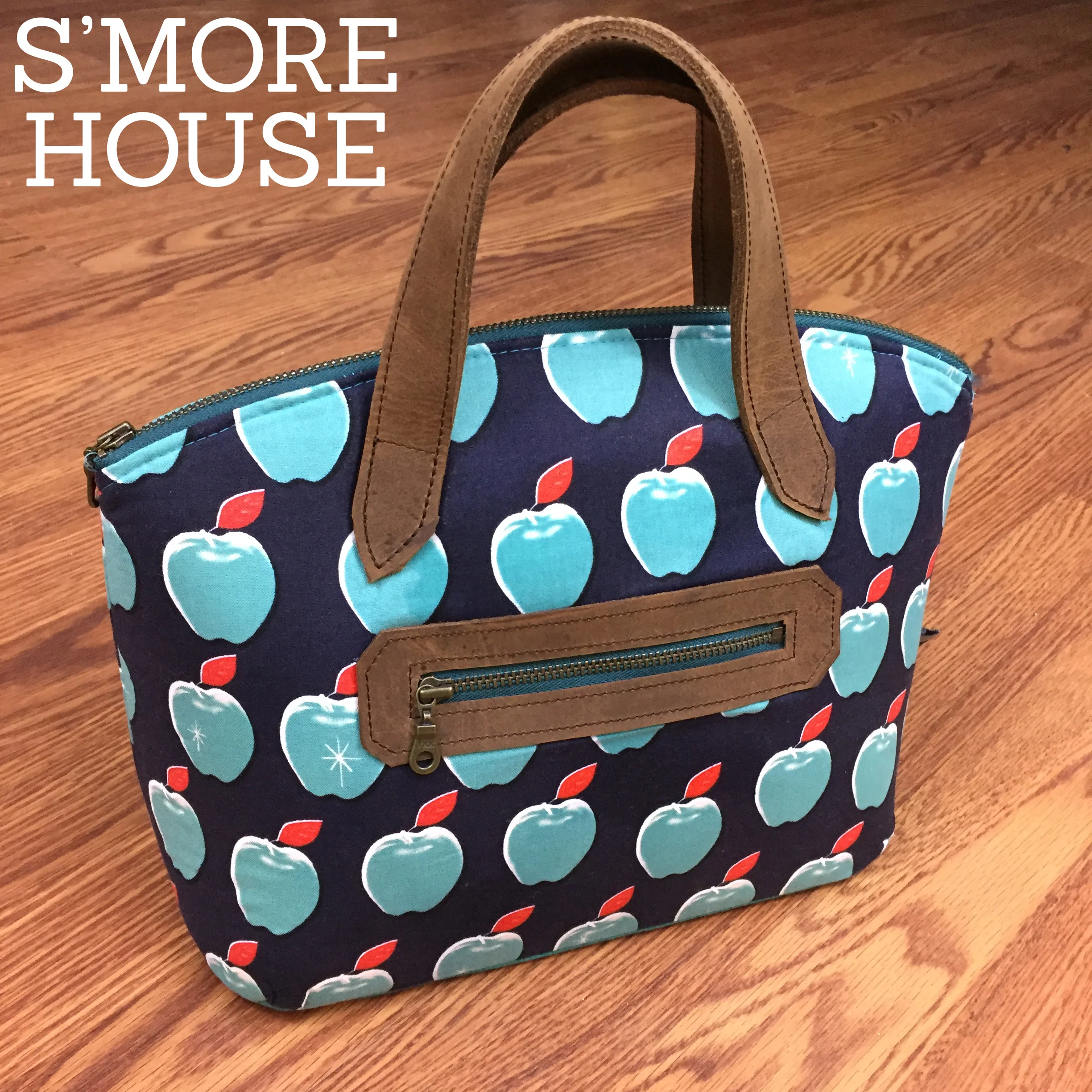 Lola Domed Handbag in Cotton and Steel and reclaimed leather.