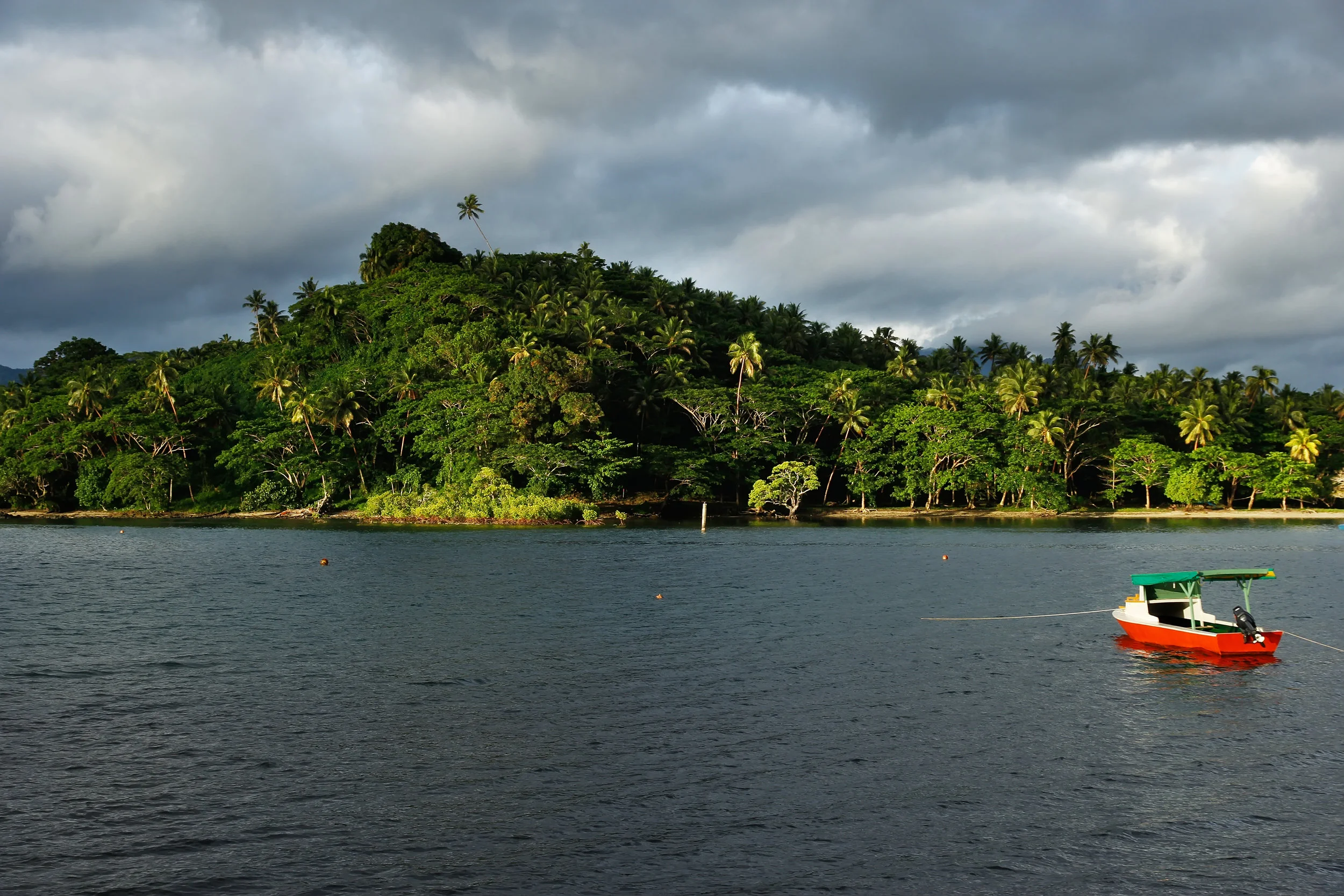 Colorful boat at Savusavu harbor, Vanua Levu island, Fiji