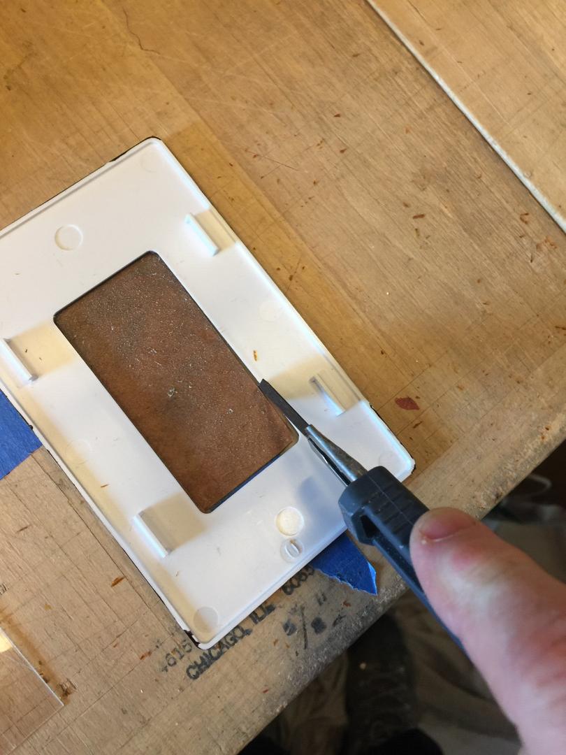 Trimming the switch plate.