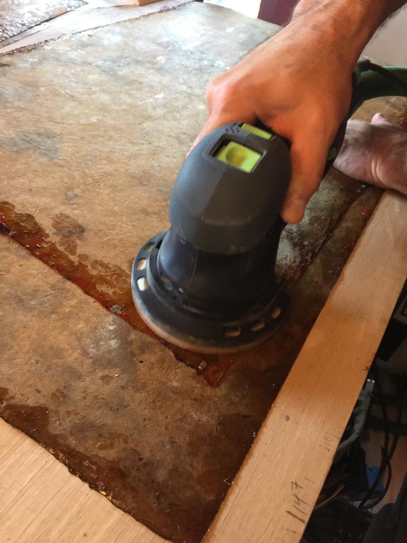 Sanding the panels.