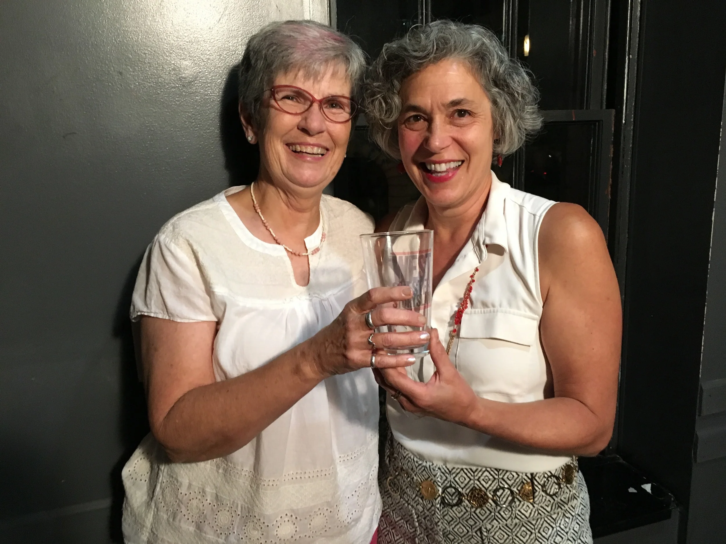 Diane Yannick and Jane Butler pose with the prized pint glass!