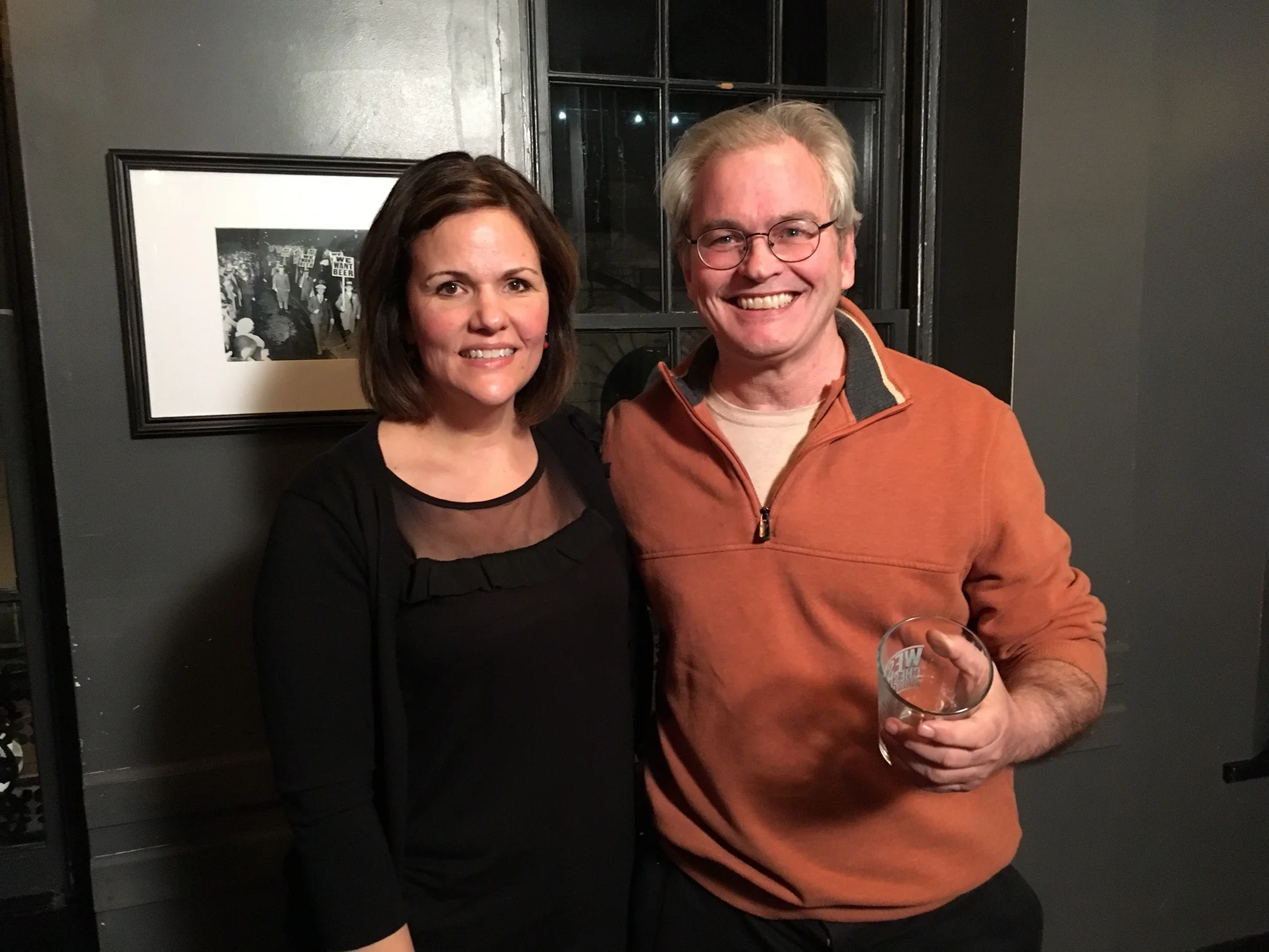 Emcee Luanne Sims poses with February winner Patrick Carmody
